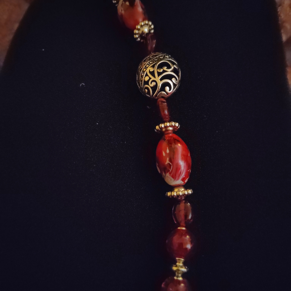 Elegant Red Beaded Bracelet with Intricate Silver Accents - Picture 3 of 3